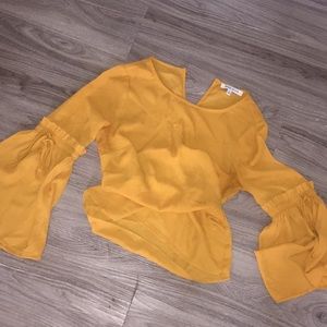 Top with bell sleeves